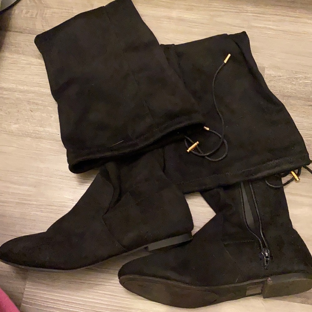Over the knee suede boots. Zip half way up. String tie closure for snug fit